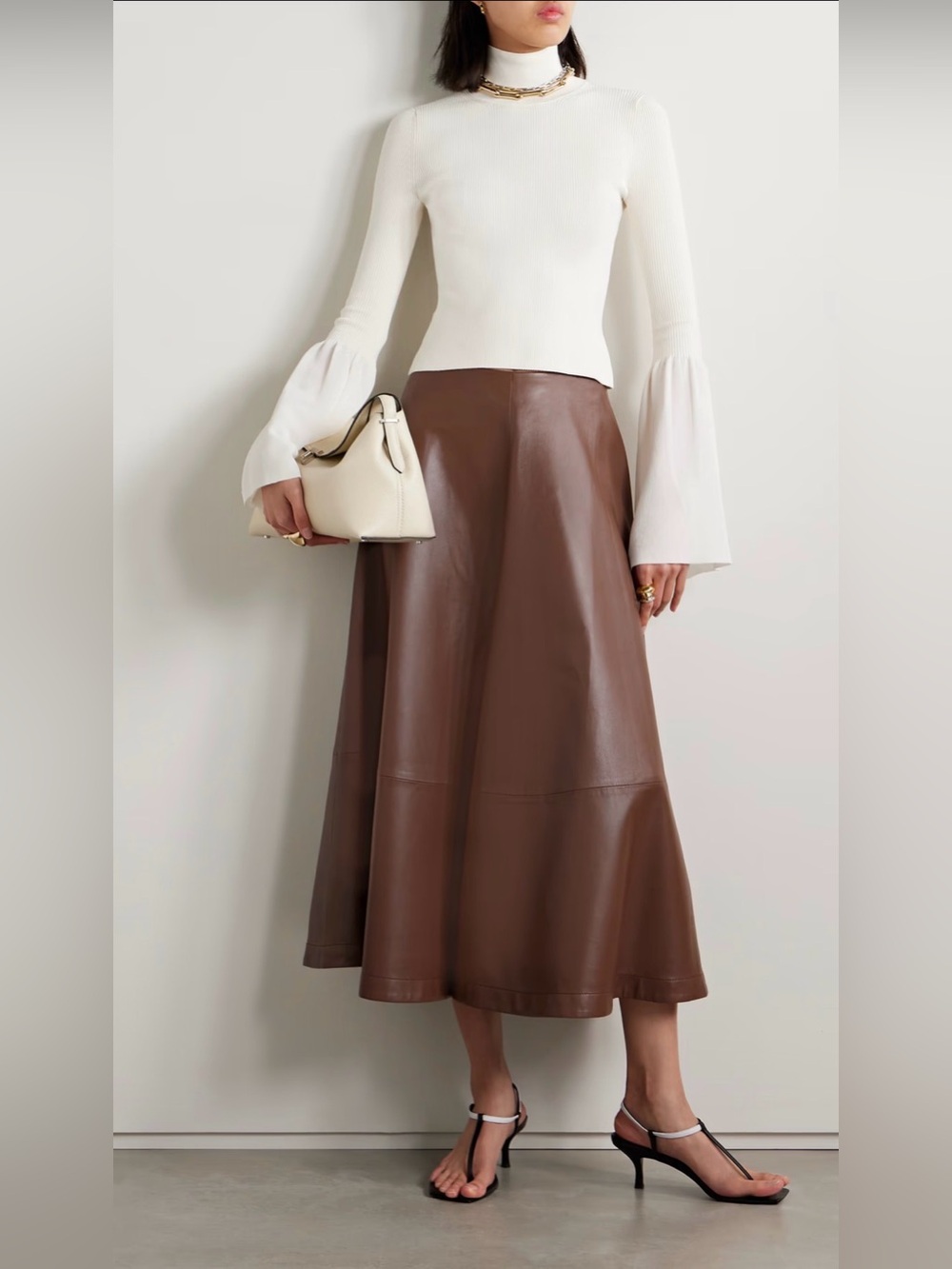 $795 ALTUZARRA
Dana jersey-trimmed ribbed stretch-knit turtleneck sweater